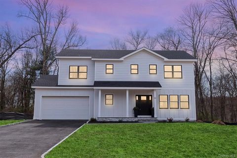 New Construction. Phase 2 of Little Flower Estates overlooking Hollow Brook Golf Course built by one of Westchester's Premium Builders is now available. This 4 Bedroom / 2.5 Bathroom Colonial is perfectly situated at the end of the cul-de-sac with di...