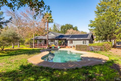 At the end of a quiet country lane in the heart of Glen Ellen's Valley of the Moon, this exquisite home offers a unique blend of tranquility and easy going relaxation. Owned by the original family since 1979, the home has been a cherished space fille...