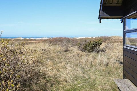 Idyllic and high situated on a magnificent dune plot and with fantastic sea views of the beautiful and unique nature that Tversted is so famous for - and of course the rushing sea - lies this solidly decorated cottage, which makes you feel relegated ...