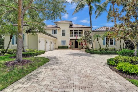 Masterfully designed & nestled within prestigious & nationally ranked Old Marsh Golf Club, this exquisite custom residence showcases seamless indoor-outdoor living with a blend of golf & water views. Quietly located at the end of the culdesac within ...