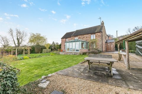 Situated along a quiet lane on the southern flank of the iconic May Hill, this detached stone-built period home enjoys a prime location with equestrian facilities and stunning views towards the Cotswolds and the Malvern Hills. This delightful 19th ce...