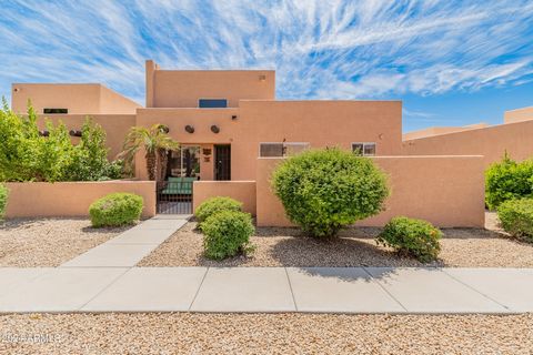 Nestled in the vibrant community of Peoria, Arizona, this exquisite corner-unit townhome captures the essence of Southwestern charm with its distinctive Santa Fe-style architecture. As you step into this home, the abundance of natural light and tall ...