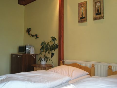 In my own guesthouse (Pension Kozel Říčany) I offer rooms and suites equipped with: bathroom, fridge, TV, wifi. There is also a kitchenette in the apartments A total of 13 rooms and suites with a capacity of 2-5 people. The beds are comfortable 90x20...