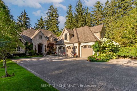 Nestled within the enchanting embrace of Ancaster Village, this magnificent Atherton Builder's home stands as a testament to timeless elegance and unparalleled craftsmanship. Beyond the grand gates lies a sprawling estate, spanning nearly half an acr...