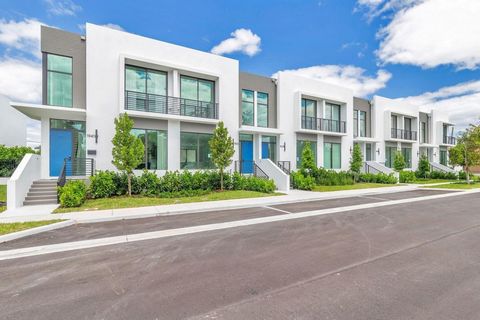 Known as Park Central, a sophisticated modern townhome community, was thoughtfully designed by award-winning Borrero architecture firm and built by Sam Fisch Development. Located in the heart of West Palm Beach, two minutes from downtown, ''The Squar...
