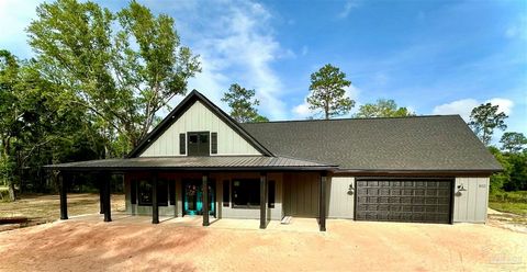 LOCAL + QUALITY CRAFTMANSHIP! Enjoy privacy and country living with close proximity to town and easy access to I-10! This new construction 3 bedroom / 2 bathroom residence sits on a full acre. There is not an HOA, so bring your boat and toys! It feat...