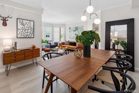 Largest one-bed floorplan at 240 Lombard St. You enter into a long hallway, perfect for showcasing your favorite artwork & photos. The new LVP flooring & paint throughout create a modern, unified style in the home. There's an updated kitchen with qua...