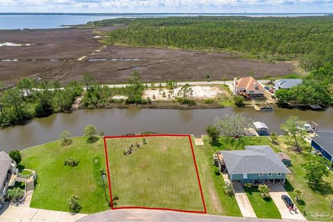 Come build your dream home on this beautiful canal-front lot in the Monterey Shores subdivision in Milton! This lot has 120 feet of canal frontage, with a seawall, and is completely cleared and ready for you to make your dreams a reality. This proper...