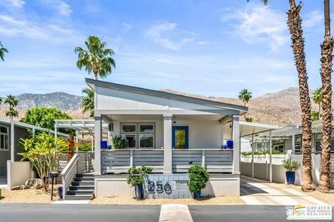 Welcome to 256 Lei Drive! Located in the fabulous Palm Canyon Mobile Club which is Palm Springs' premier mobile home community. This east facing 2 bedroom, 2 bath home offers a spacious floor plan, with an open and bright living room, airy kitchen wi...