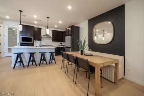 Monument at Reverence is Pulte's newest townhome community situated in west Summerlin. The community is elevated above the Las Vegas valley with nearby outdoor amenities. This Cornwall floorplan offers a desirable rooftop deck. The home also includes...