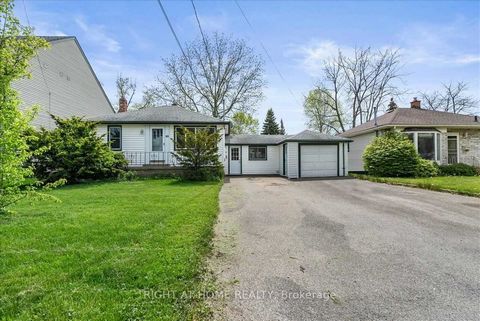 Welcome to 89 Bayview! This Cozy Bungalow With Lake View Offers a Fantastic Location and Generously Sized Lot with Great Potential! This Home Features 2 Bedrooms, Mud Room/Breezeway, Attached Garage, Large Partially Finished Basement, Ample Parking a...