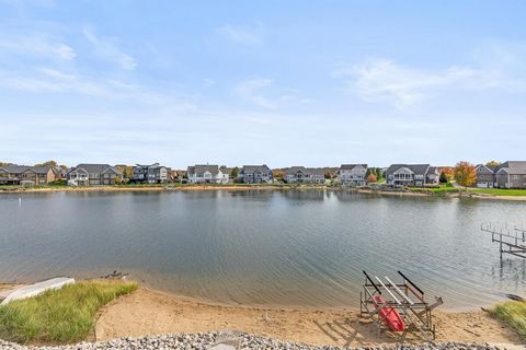 Stunning home on the water in Georgetown Shores! Nestled in the cove of this 140 acre all sports lake, you can enjoy boating , fishing ,paddle boarding, kayaking, and the tranquil views! The main floor of this home includes a chef's kitchen with Viki...