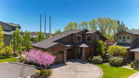Experience the Bend lifestyle from this coveted RIVERFRONT property steps to the Old Mill & moments to Downtown. Situated on a private .14/ac fenced lot w/stunning river & Cascade views, this home boasts exquisite NW Contemporary design throughout. G...