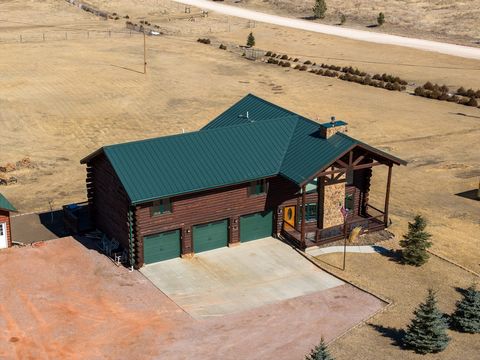 Deerfield Lake Cabin is a two-story, 4-bed, 3.5-bath log cabin on approximately 3.6 acres. With a finished basement, three-stall garage, and spacious shop, it seamlessly blends comfort and functionality. Just 9.9 miles from Hill City and 6.2 miles fr...
