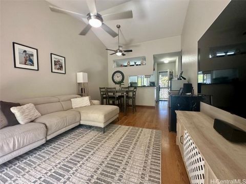 Your Perfect Paradise Awaits! Imagine coming home to a beautifully designed condo nestled in what seems like a tropical paradise. Welcome to the highly desirable and tranquil Mililani community of Streamside at Launani Valley! This beautiful 2 bedroo...