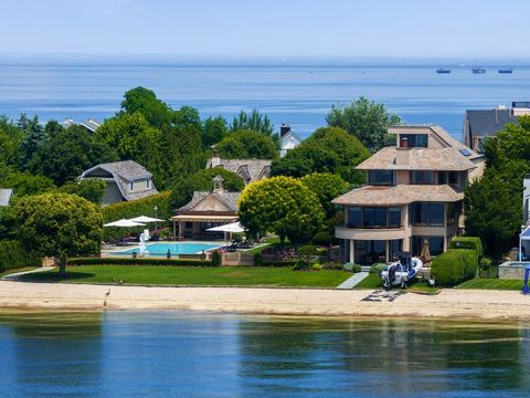 Indulge in the ultimate luxury at this magnificent beachfront estate, where superior European craftsmanship meets world-class finishes. Designed by the esteemed architects Keller and Sandgren, AIA, this architectural masterpiece features resplendent ...