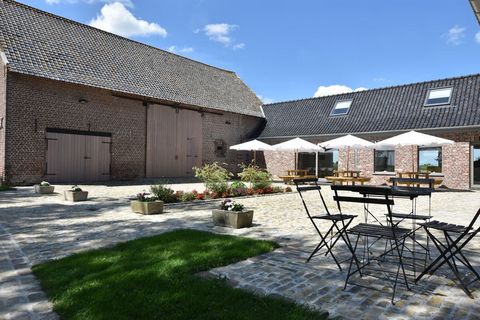 This serene mansion in Poperinge is spacious with 6 bedrooms for 22 people to stay comfortably. It has a roofed terrace, fenced garden, and barbecue and is perfect for a group or families with children to enjoy. The beach at 25 km is perfect to spend...