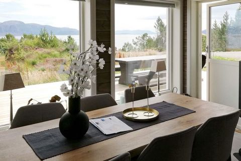 Modern holiday home with large terrace and sea views close to the fjord. Contains everything a modern home requires, such as internet and streaming TV in addition to Norwegian channels and Riks-TV. Frame mattresses in all rooms. Cozy wood burning sto...