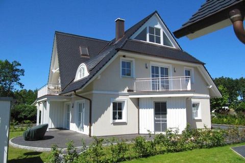 Mecklenburg-Vorpommern's longest beach is waiting for you! Only 150 meters from the Baltic Sea, this holiday apartment with a fireplace and WiFi on the ground floor of a small apartment house offers you the best conditions for a relaxing holiday. The...
