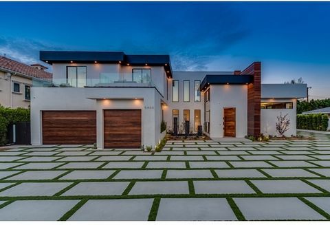 Modern Architectural Masterpiece is extraordinary and unique, located in one of the most desirable pockets of Amestoy Estate. This Dramatic Contemporary home offers high living style with Ultra Luxurious finishes which includes a Roof Deck & Elevator...