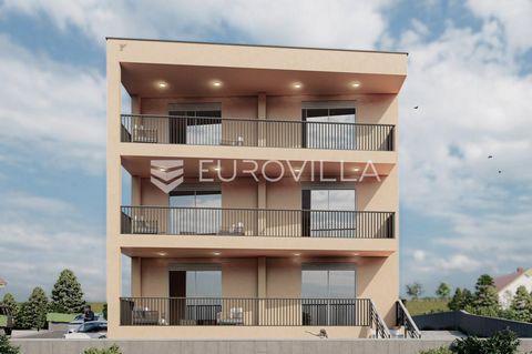 Zadar, Bili Brig, two-room apartment in a residential building with a total of five apartments, gross floor area 81.49 m2. It consists of two bedrooms, a bathroom, an open concept kitchen, dining room and living room and a balcony with a view of the ...