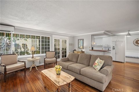 Unique remodeled European cottage-style Cordoba model, w/French country charm in this 55+ Community; no one above or below, includes stackable w/d.  Open concept remodel encloses Atrium adding square footage, bathed in natural sunlight from skylight ...