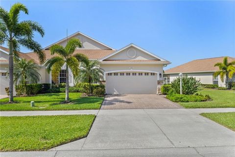 WOW! Check out this view! Enjoy the Florida lifestyle in this exquisite maintenance free carriage home in the desirable Lakeside Plantation community. This move in ready villa features 2 bedrooms, 2 baths, office/den and 2 car garage as well as the n...