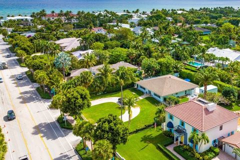 Ocean Ridge, Florida - 'Enjoy the South Florida Lifestyle in this Fabulous Estate Home! Enter through the secure electronic gate onto your brick-paved driveway leading to your detached two-car garage, and the front home entry with two gorgeous Medite...