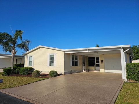 MOVE IN READY, LARGE DRIVE, REDUCED $15,000 THIS 2 BR 2 BATH COMES FURNISHED AND SUPER CLEAN. A SPACIOUS ENCLOSED LANAI IS YOURS FOR A FRIENDLY GATHERING OR PERHAPS A LITTLE QUIET TIME. LOCATED IN A VERY QUIET SECTION OF THIS TOP-END 55+ COMMUNITY. T...