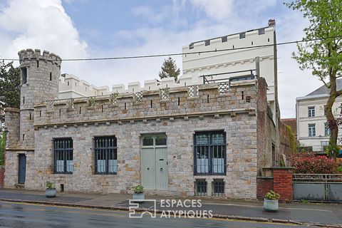 In the heart of the town of Bethune, this 307 m2 building was built for the Duchess of Luxembourg at the end of the 19th century at the request of Fernand Bar. Built on 3 floors, it reveals a keep, loopholes and battlements that give it the appearanc...