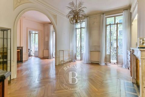 EXCLUSIVITY - PREFECTURE. You will be seduced by this bourgeois apartment of 218.62 sqm (living area: 225.09 sqm) located on the second floor of a beautiful listed Haussmann building (stained glass, frescoes). With two landing doors and flanked by 23...
