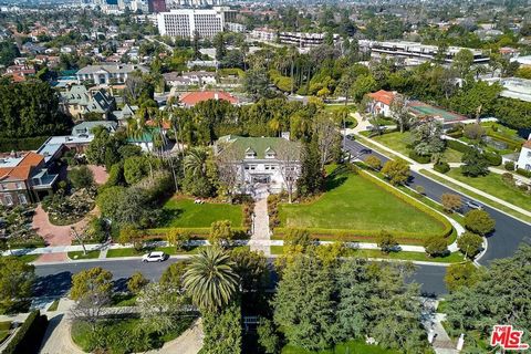 AUCTION: BID 26 APRIL-15 MAY. Listed for $13.5M. Reserve. No Minimum Bid. Exceptional luxury and historic provenance come together in this 1915 Hancock Park estate once owned by Muhammad Ali. The property has an aesthetic gravitas worthy of its forme...
