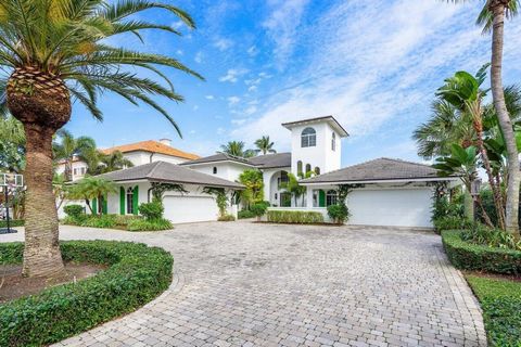 Welcome to your dream waterfront oasis that brings Palm Beach Island to Jupiter! Enjoy the ultimate waterfront lifestyle with over 100 feet of water frontage. For boat enthusiasts, there's a 75 ft. boat slip, two additional slips, and a floating dock...