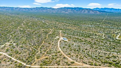 Amazing opportunity is becoming hard to find. Over 120 acres of private FULLY FENCED and gated land with a brand new Modular home. Two motorized gates for enhanced privacy. Stunning 360 views of multiple mountain ranges and peaks. Private gun range a...
