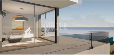 Single-story 4-bedroom villa with 393 sqm of gross construction area, set on a plot of land of 1,210 sqm, with sea views in Calheta, Madeira. This villa, with a contemporary architecture, follows a modern and minimalist style and has been meticulousl...