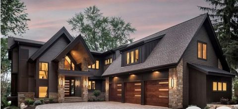 *To Be Built Home.* Welcome to your future dream home nestled on the picturesque shores of Lake Minnetonka in the coveted Woodland Cove neighborhood. This stunning custom to be built residence offers the ultimate blend of luxury, comfort, and tranqui...
