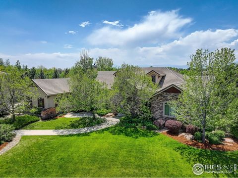 Welcome to this Extraordinary property located in West Longmont just 15 minutes from Boulder and the Flatirons. Come explore this expansive mountain style ranch with a fully finished basement with Movie room, wet bar, game room with pool table, foosb...