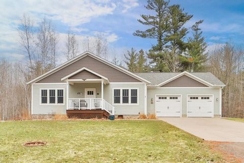 Don't miss this hard to find South Long Lake home on 6+ acres. This three bedroom, three bath craftsman style home features an open floor plan, hardwood floors, heat pump, in-floor heat, paneled doors, pantry, central air, main floor laundry, great c...