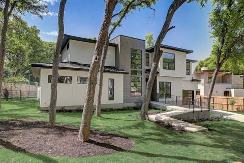 2605 Rae Dell is a truly exceptional new construction property located in the highly coveted Barton Hills neighborhood of Austin. Custom built by MAG Construction Management, with its sleek and contemporary design, this home is a true work of art. As...