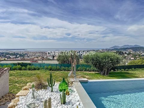 On the heights of Le Cannet, this superb neo-Provencal villa of around 300m2 benefits from panoramic views over the bay of Cannes, the Lérins Islands, and the Estérel massif. It comprises a large reception room with a fully-equipped kitchen and a cen...