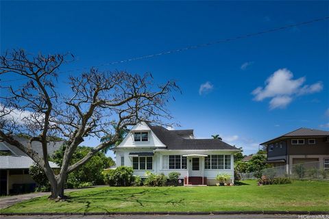 Welcome to a piece of history in the heart of the desirable Manoa Valley. This stunning single-family residence offers a unique blend of historical charm and modern convenience. Enjoy the serenity of the valley while being just minutes away from down...