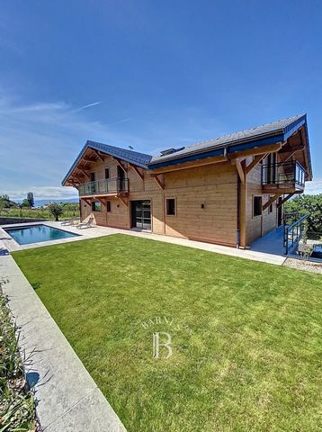 In der Nähe von Évian-les-Bains, in einer ruhigen und privilegierten Gegend, ist dieses lokale Chalet 