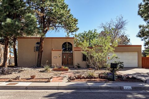 Don't miss your opportunity to own this MOSSMAN built home on a large lot in the established Highlands North neighborhood adjacent to Arroyo del Oso Golf Course. Great floorplan includes 4 BR, 2 baths, 2 living spaces and heated sunroom. Oversized fa...