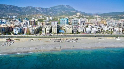Alanya-Mahmutlar SEAFRONT FULL LUXURY FURNITURE - 1+1 50m2 - American Kitchen - West façade - 1 Balcony - 1 bathroom wc -Pool, 24/7 Security, Parking, Camellia, Underpass to the Sea, Generator CONTACT US FOR DETAILS Features: - Alarm - Doorman - Dish...