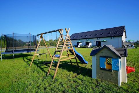 On the edge of a charming seaside settlement, there is a family holiday resort, which offers accommodation in two-story terraced houses and plenty of green space for children to play various games and have fun. Two-story holiday homes with terraces a...