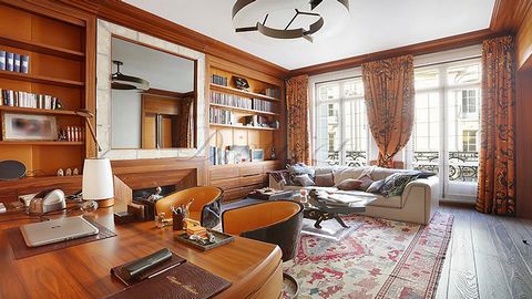 This apartment occupies the whole second floor of a luxurious Haussmannian building. Superbly renovated throughout and featuring marble and solid hardwood parquet flooring, it offers 281 sqm of living space including an entrance hall with a guest toi...