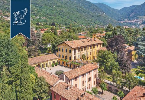 This stunning historical estate is for sale in a residential area halfway between Lake Como and Lake Lecco. It is made up of several buildings all connected to each other and measures 5,000 sqm overall. The entrance has two parallel avenues that lead...