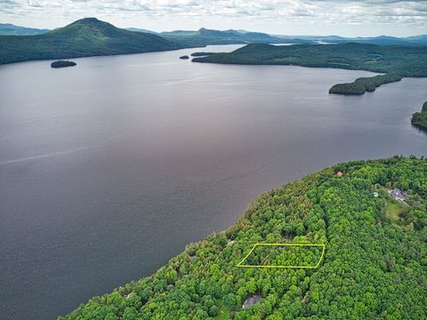 Land with ACCESS to Lake Memphremagog! Located at Domaine de la Pruchière, this 1.45 acre lot overlooks the majestic Lake Memphremagog. Clear wooded area with mature trees and possibility of a panoramic view of the mountains and sunsets. Access to th...
