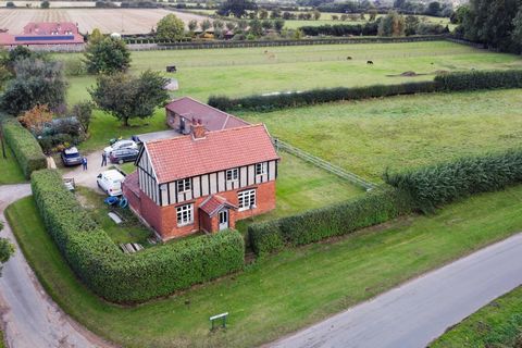 Guide Price £500,000 AN EXCITING OPPORTUNITY TO DEVELOP THIS TUDOR STYLE COTTAGE - FORMERLY WITH PLANNING FOR A SIGNIFICANT EXTENSION. Summary Located on the outskirts of one of the most sought after villages in the region surrounded by open countrys...