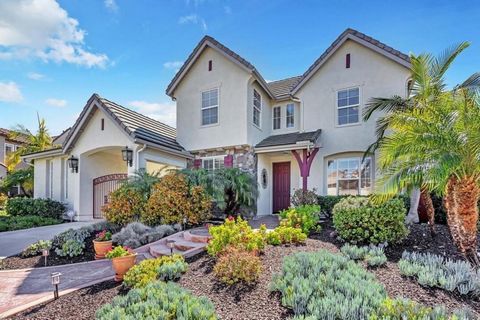 Welcome to your dream home in the picturesque city of San Marcos! This stunning property offers the perfect blend of luxury living and scenic beauty. Nestled gracefully overlooking the 11th green of Twin Oaks Golf Course, safely tucked away from erra...
